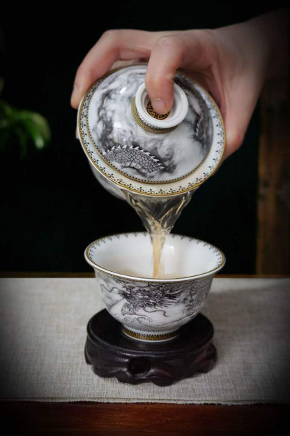 Ink Dragon gaiwan pouring tea